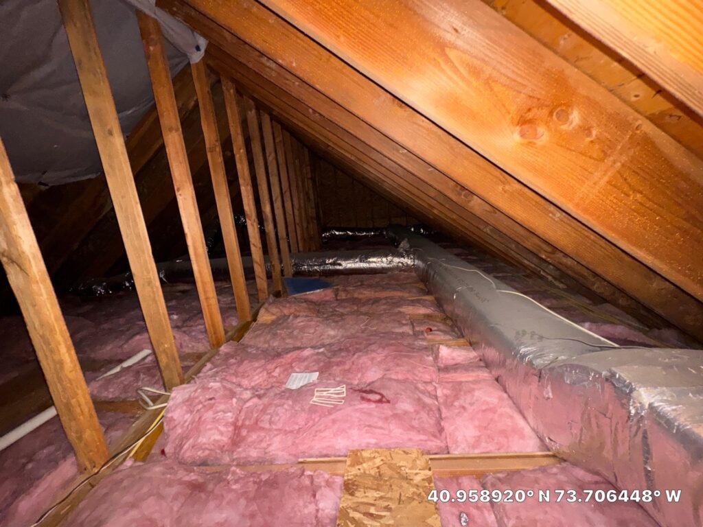 add cellulose insulation over fiberglass- Fiberglass batts insulation in home Rye, NY under code R-Value