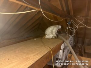 Insulation contractor Westchester & New Jersey 12 cellulose insulation getting installed in attic at hone in Mount Kisco NY