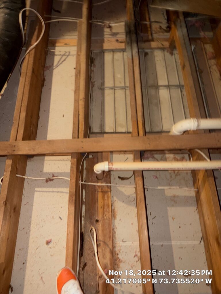 Removed batts insulation before installing cellulose at a home in Mount Kisco New York.