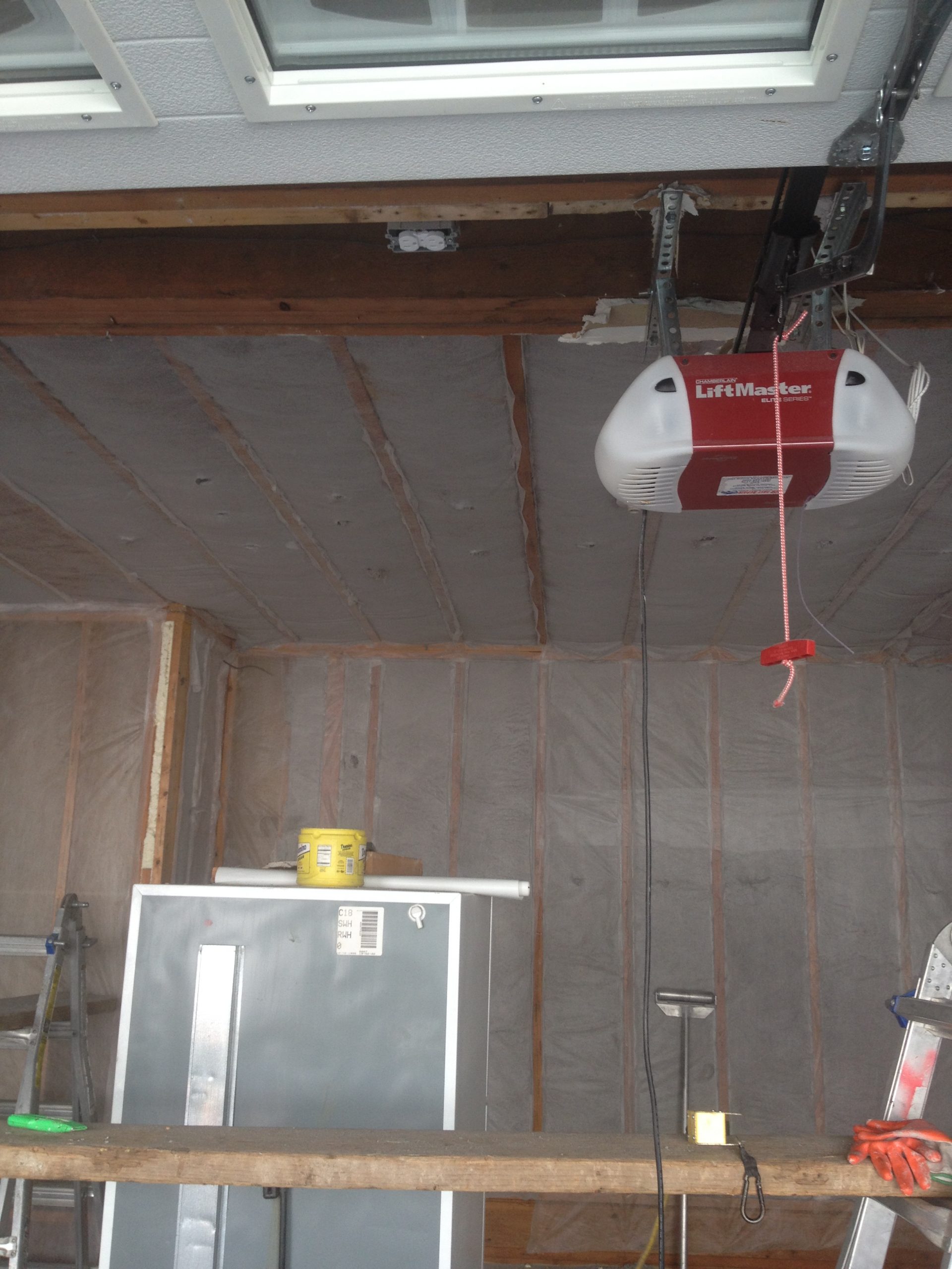Ceiling and wall insulation — garage conversion before drywall