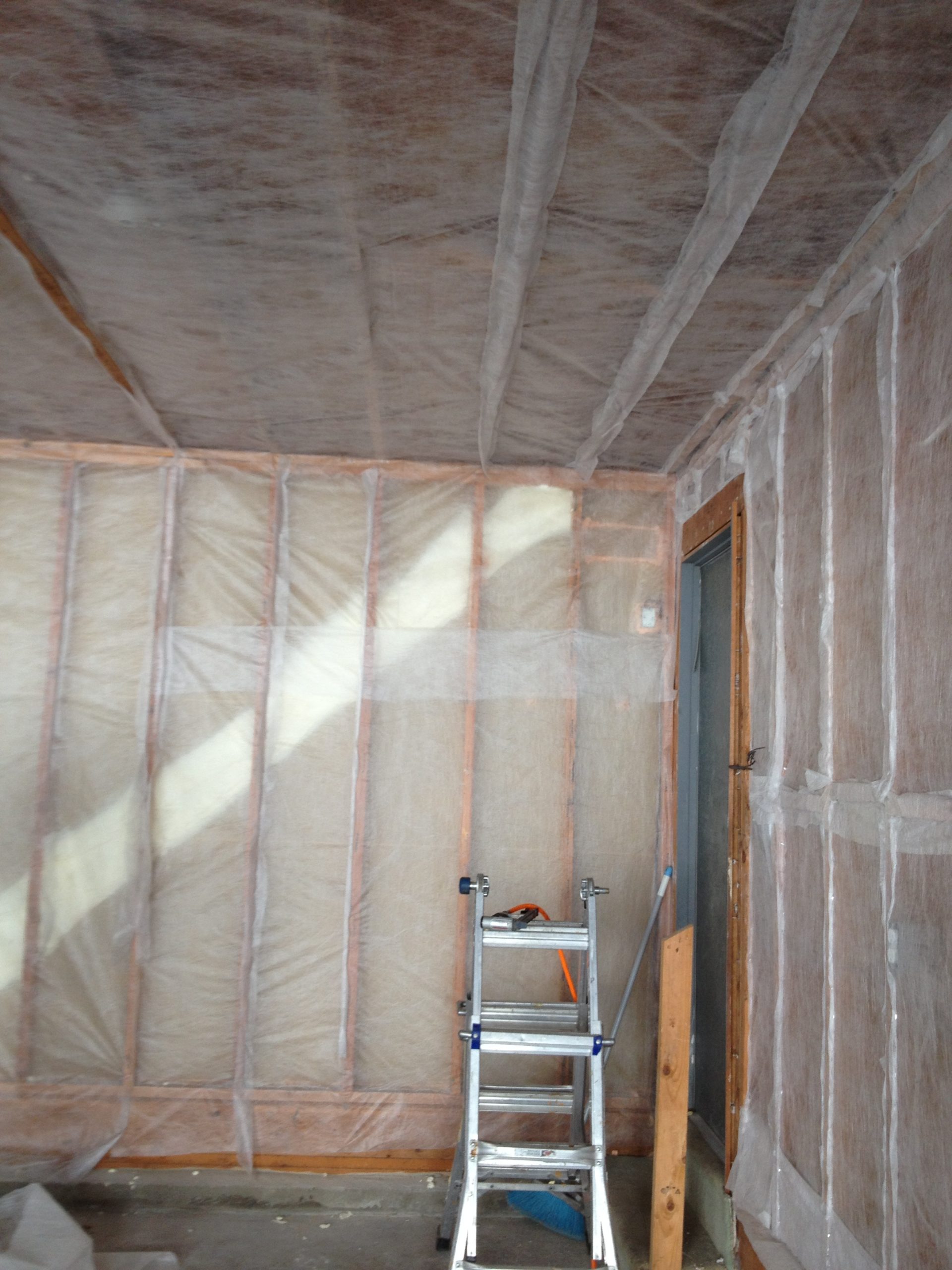 Wall and ceiling insulation installed before drywall — Westchester County