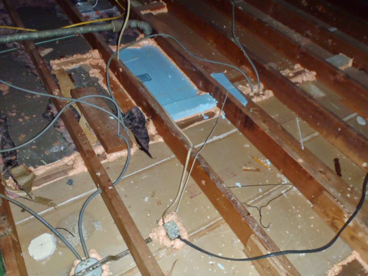 Drop soffit and top plates sealed in attic — NJ home