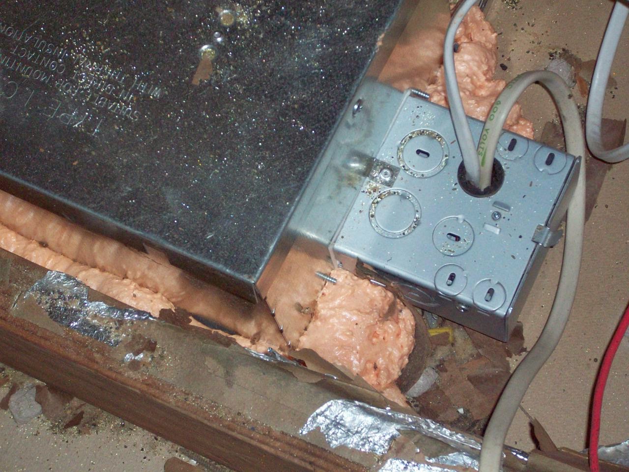 Spray foam around exhaust fan penetration in attic — NJ