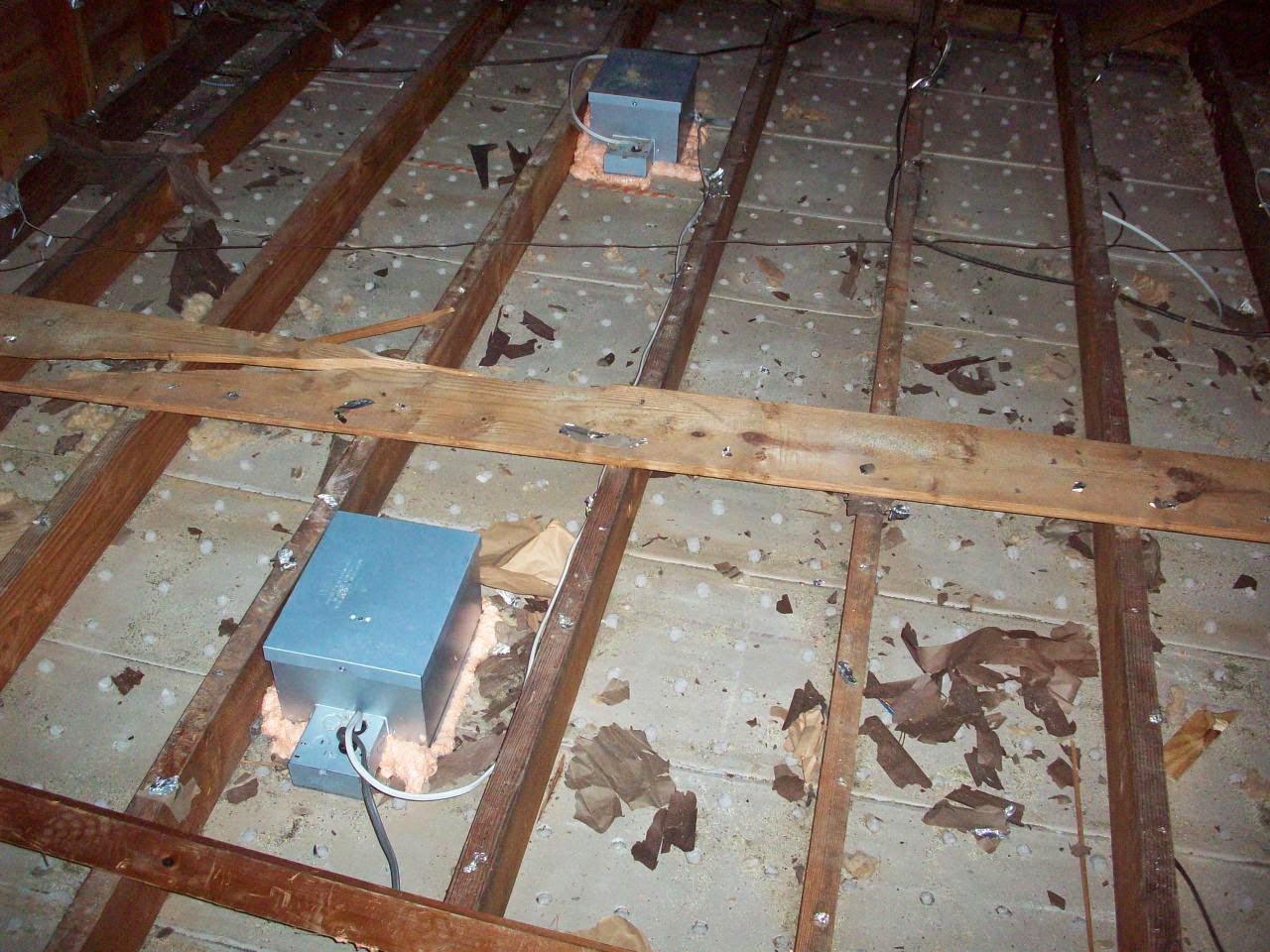 Completed attic bypass sealing — penetrations sealed before insulation