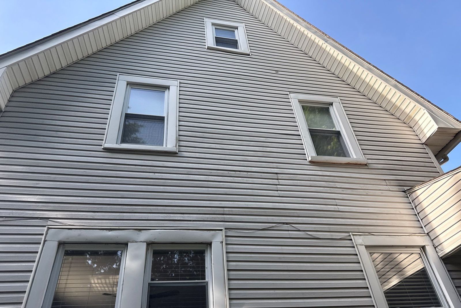 Exterior Dense Pack Cellulose Insulation Installation in White Plains, NY 8 Exterior siding fully restored after dense pack cellulose insulation project on older White Plains NY home