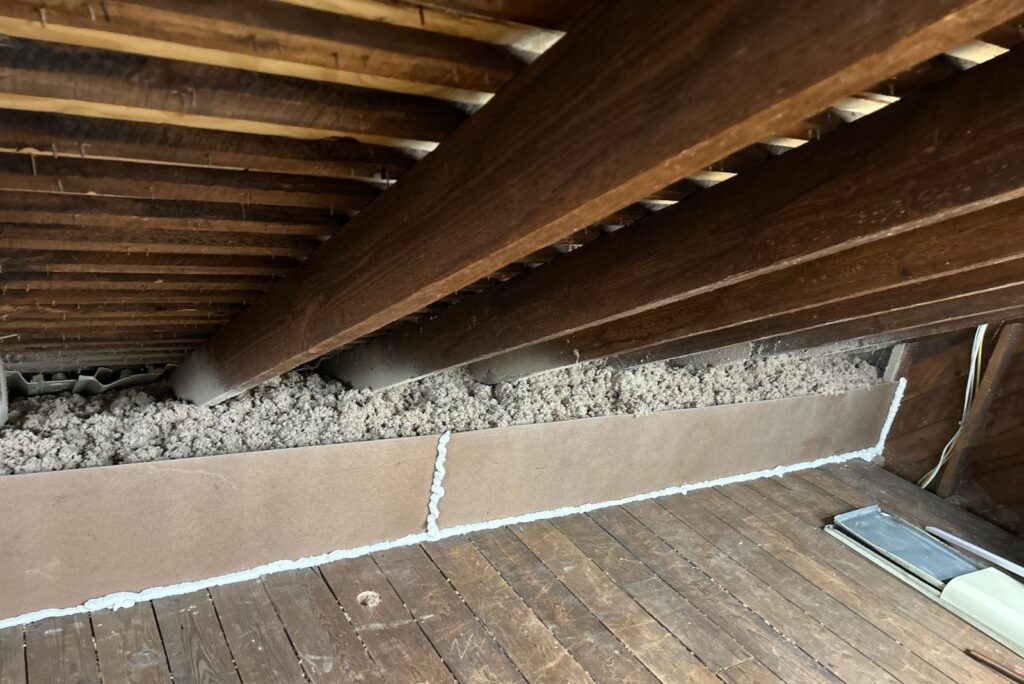 Ice Dams - Top Rated Insulation Services 4 Rigid dam sealed with foam at the attic floor edge holding blown cellulose insulation in place at the eave
