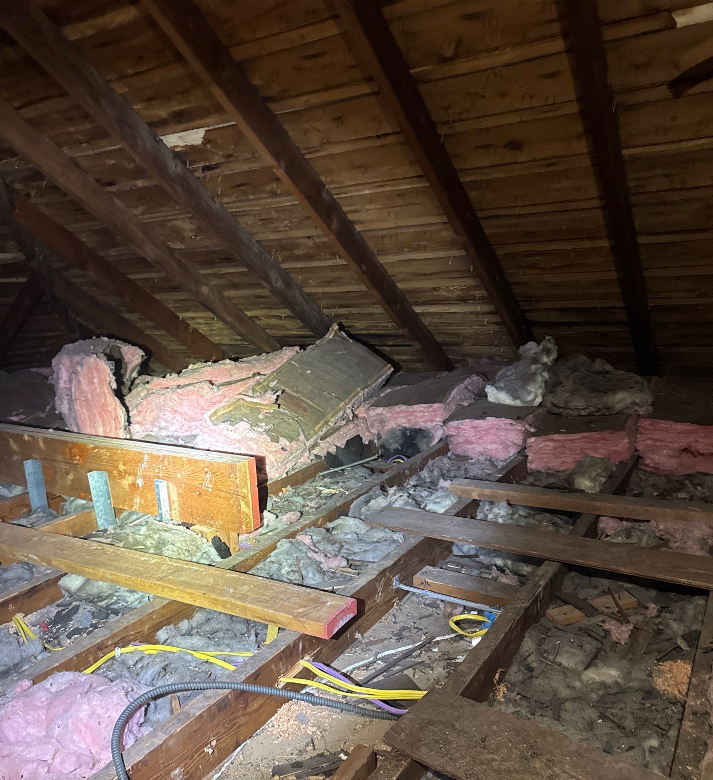 Attic, Wall and Crawl Space Insulation in Wappingers Falls, NY: Project Case Study 4 Attic before insulation in Wappingers Falls NY: thin, matted fiberglass and open gaps around wiring