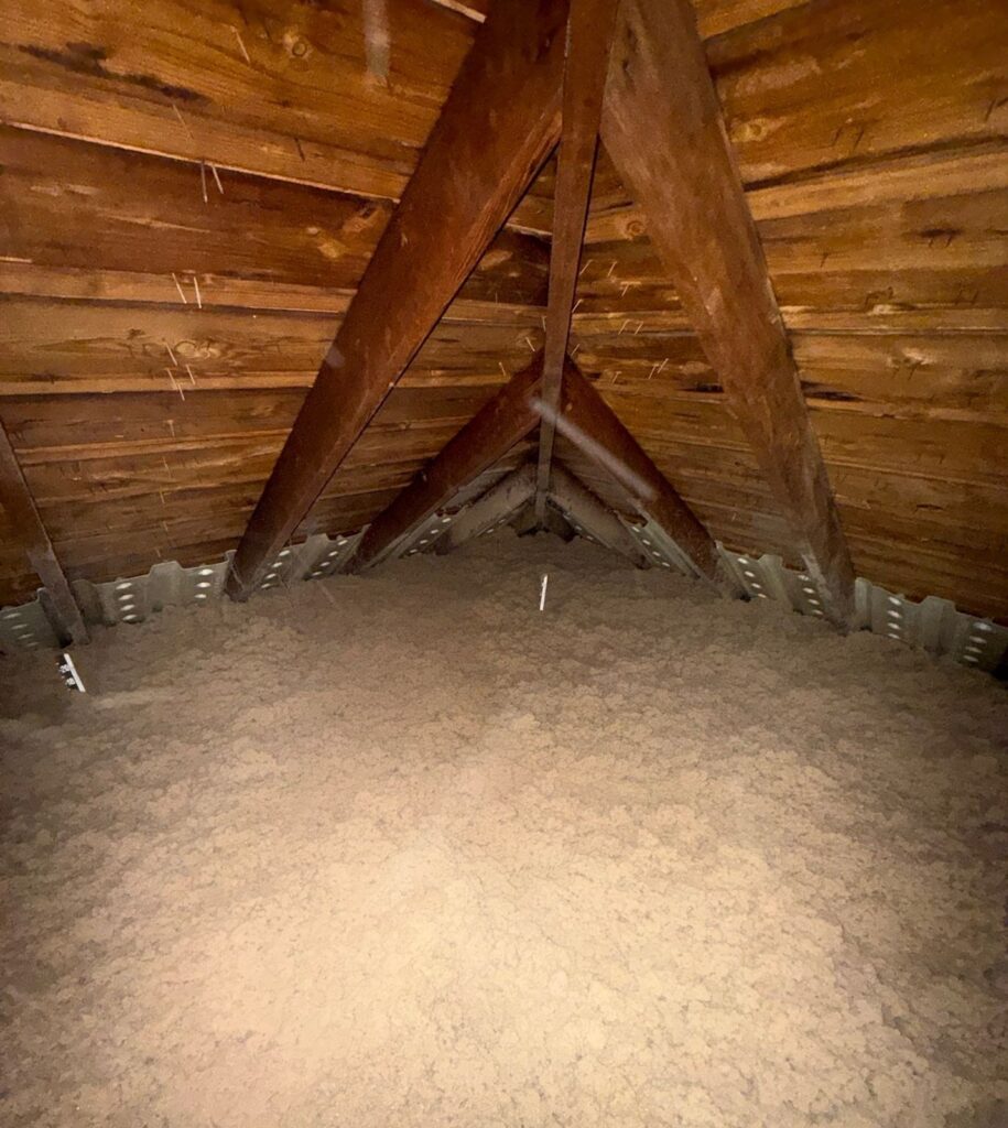 Attic after air sealing and blown-in cellulose insulation in Wappingers Falls NY