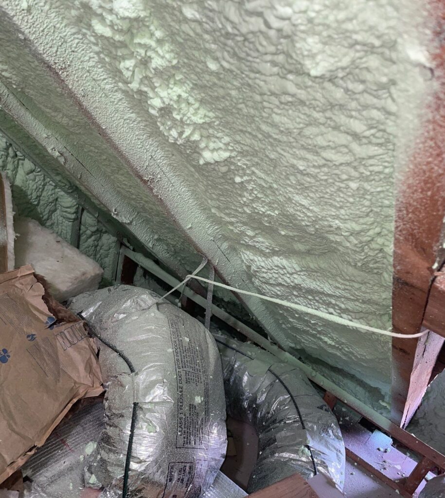 Spray Foam Attic and Crawl Space Insulation in Teaneck, NJ: Project Case Study 2 Spray foam insulation on the attic roof deck around ductwork in Teaneck NJ